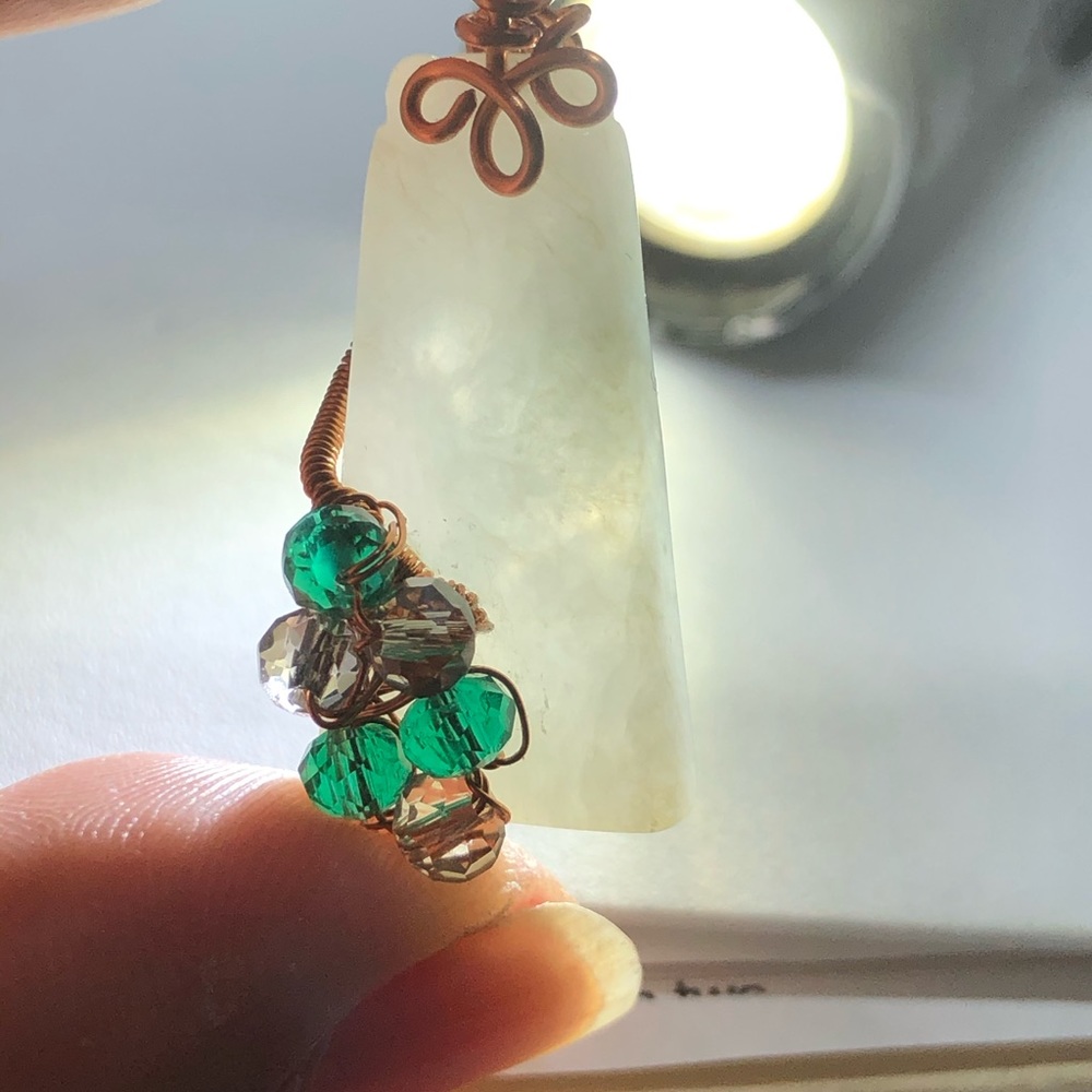 White jade, green and gray crystals pendant